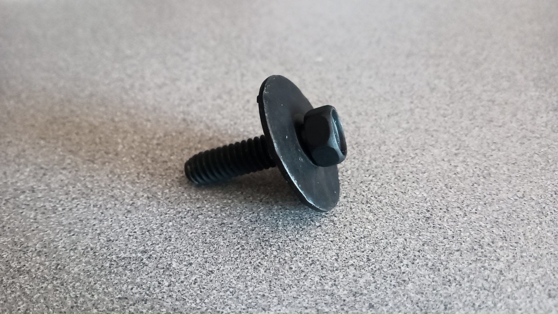 The 1/4-20 bolt with free-spinning washer